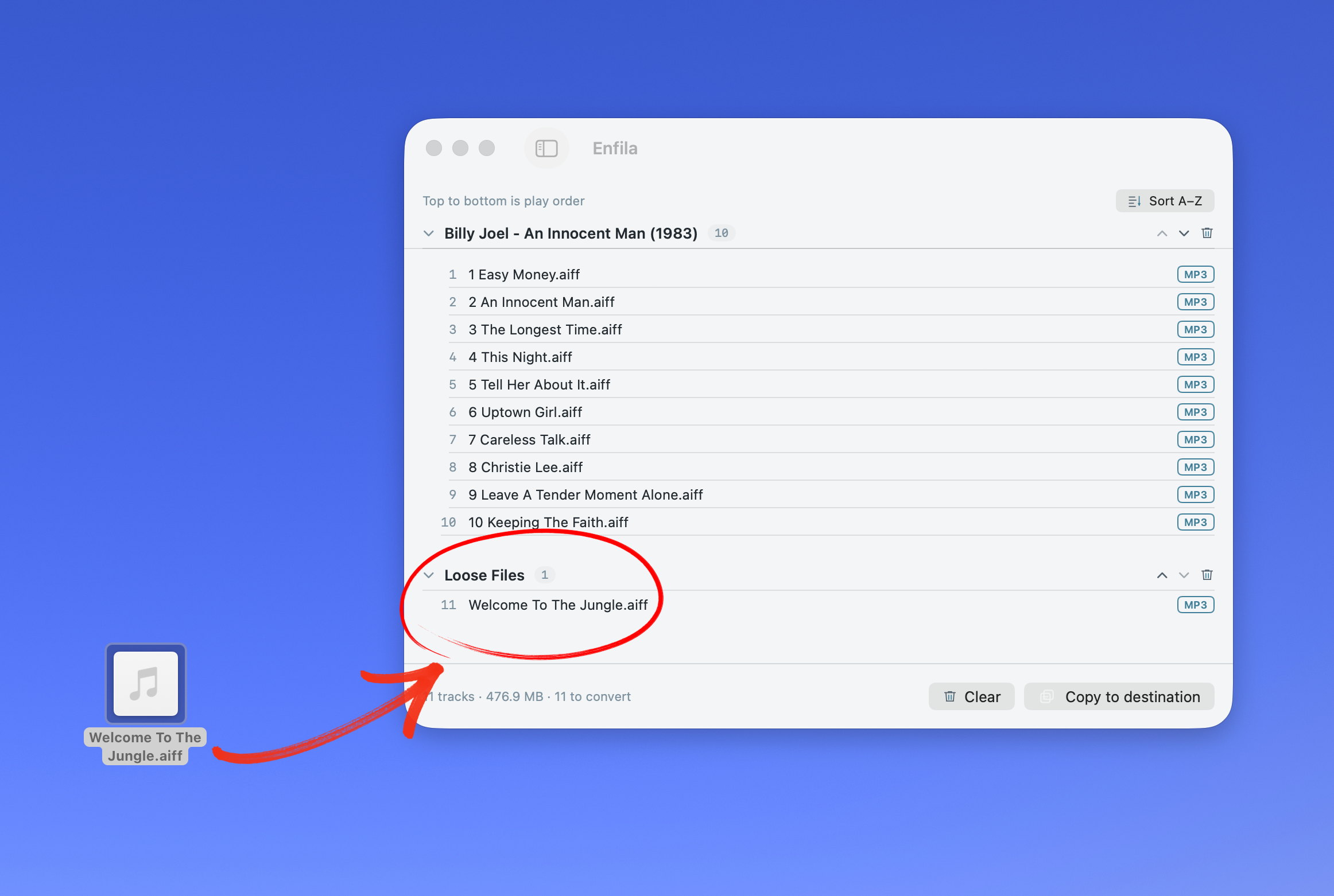 Dragging a loose track onto the Enfila window — it lands in the queue ready to copy.